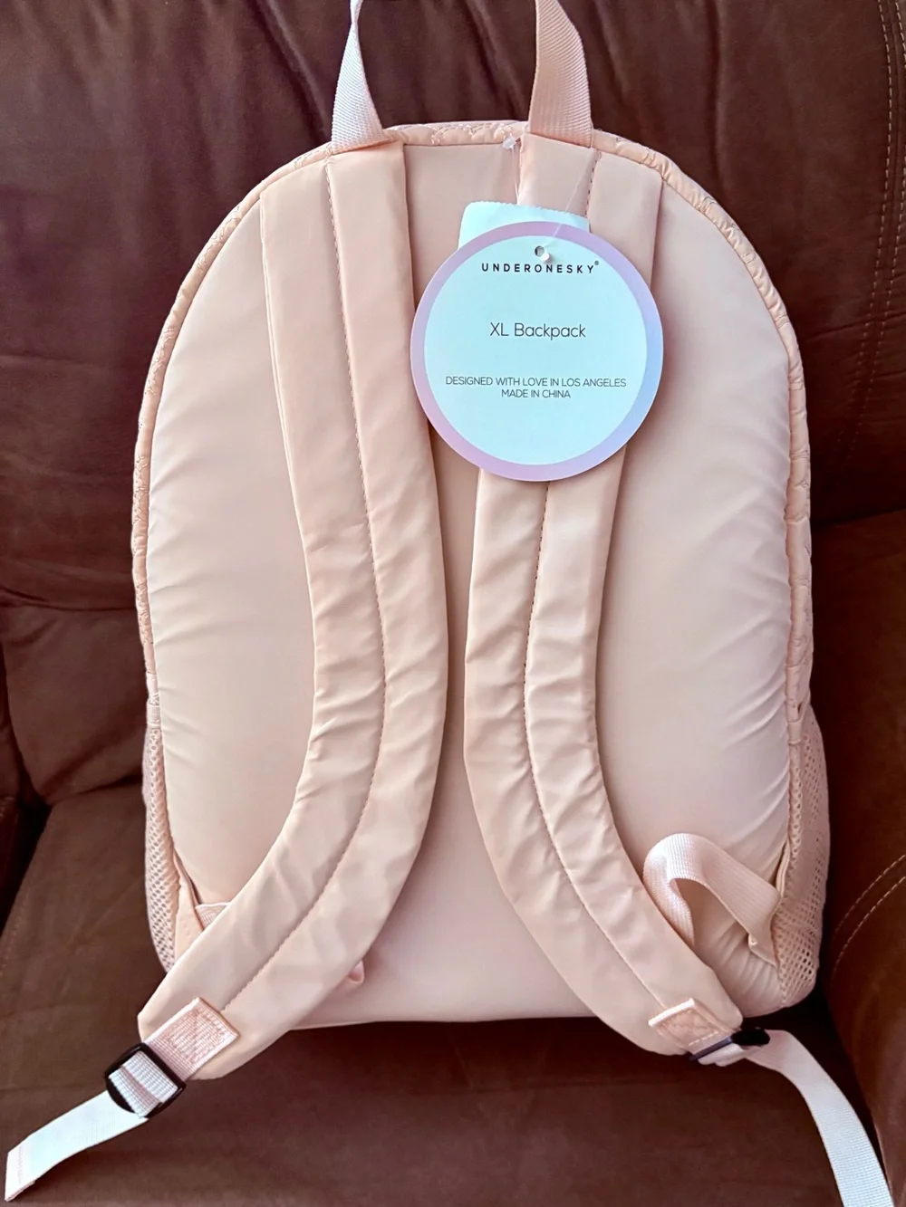 Under One Sky Quilted Heart Backpack in Light Pink with Pom Pom
